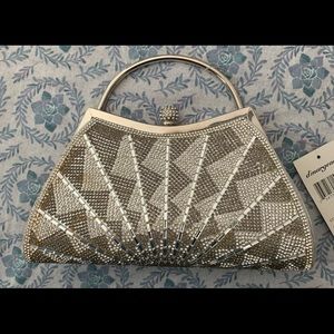 NEW Silver Evening Bag
Also Has Chain Strap